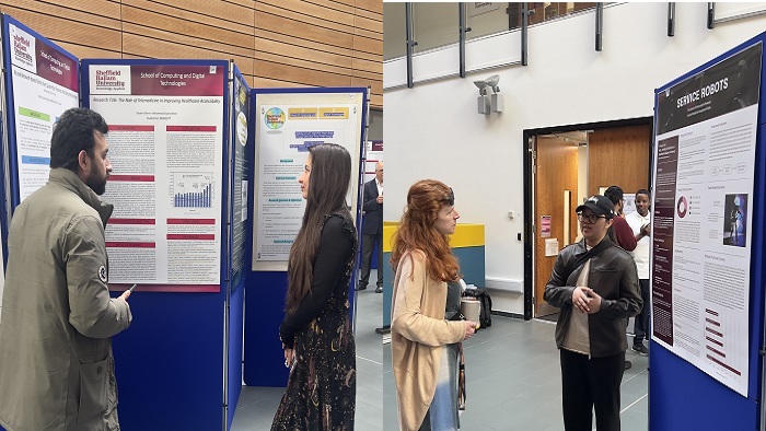 Staff and students discussing poster presentations