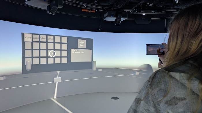 Demonstration of someone using sweeping video wall