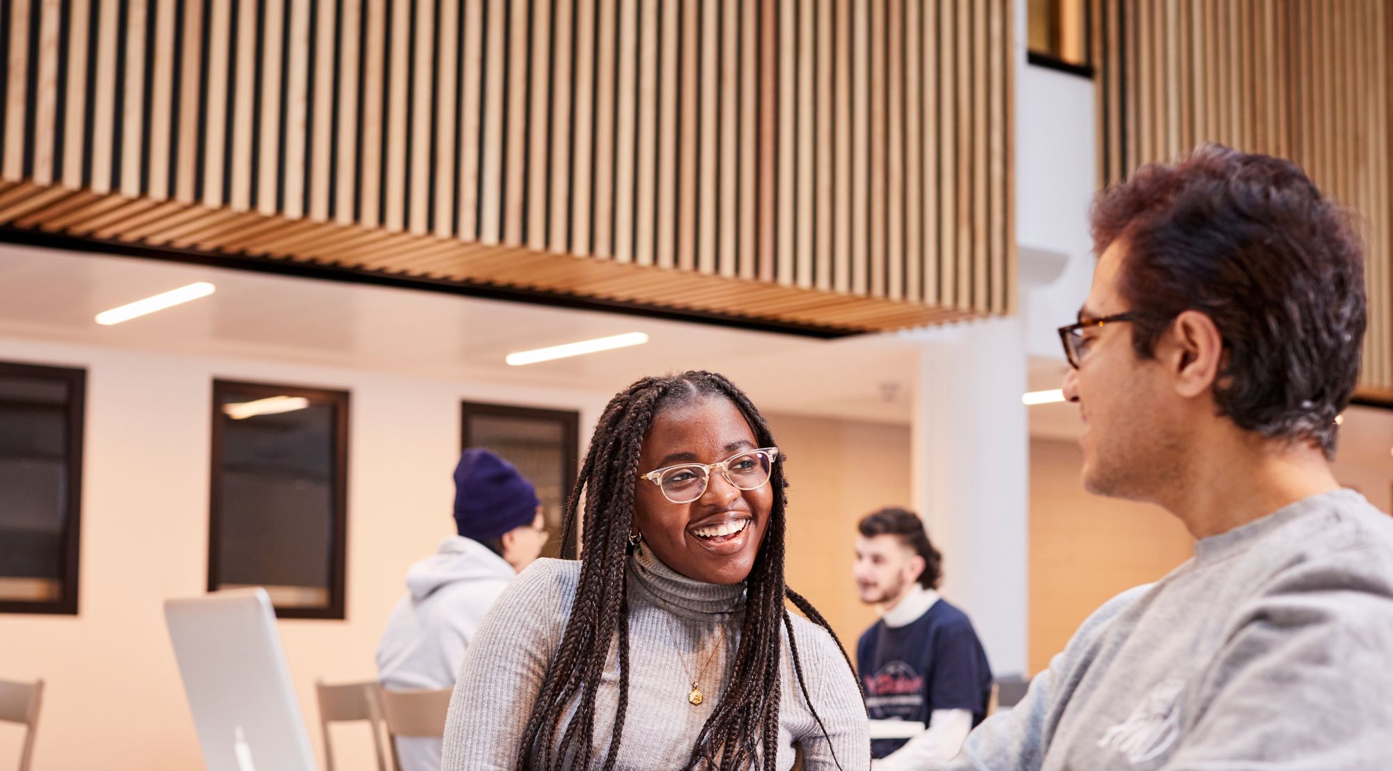 Two students chatting on campus