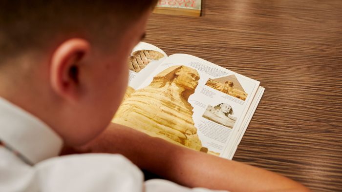 Early Years pupil reading 