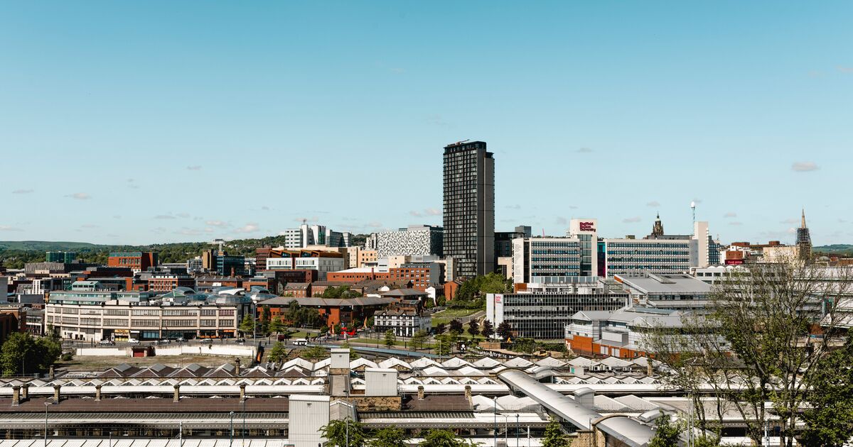 An aerial view of Sheffield Hallam University campus with blue sky and high rise buildings