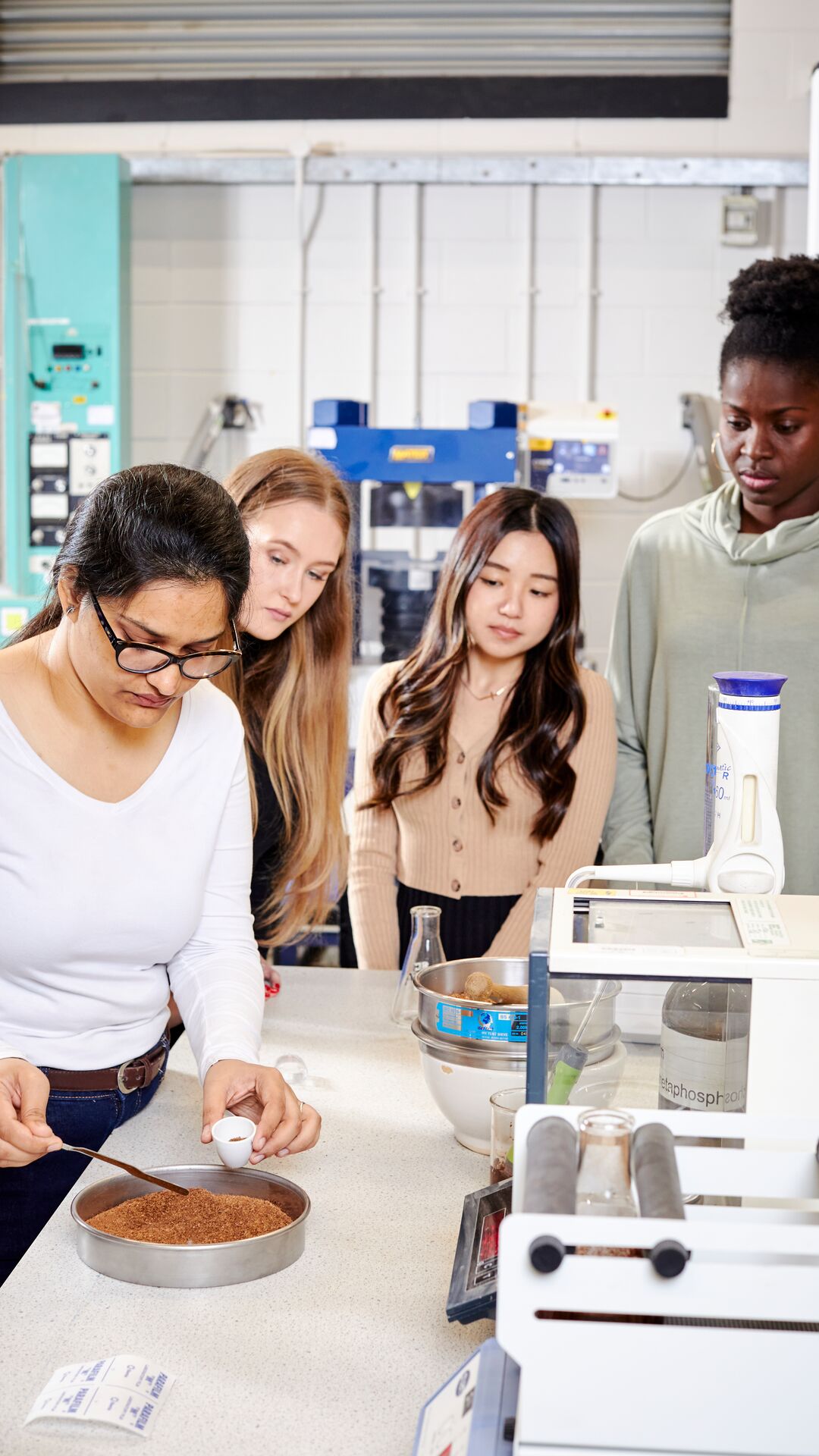 Vertical image of students in a lab