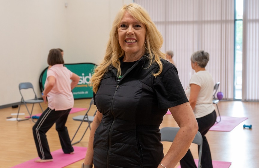People exercising in a sports hall