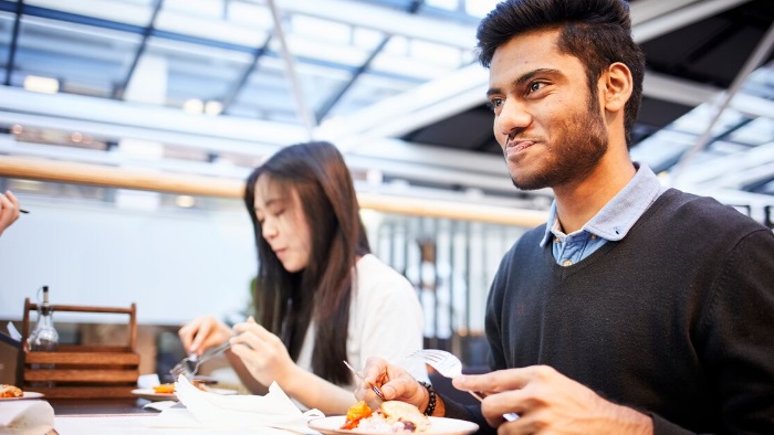People eating in a catering outlet