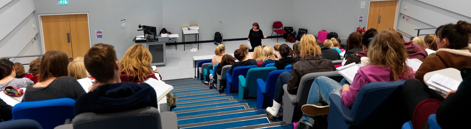 People sitting in a lecture theatre