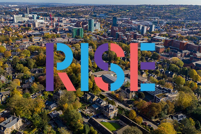 A drone shot of Sheffield with a RISE logo