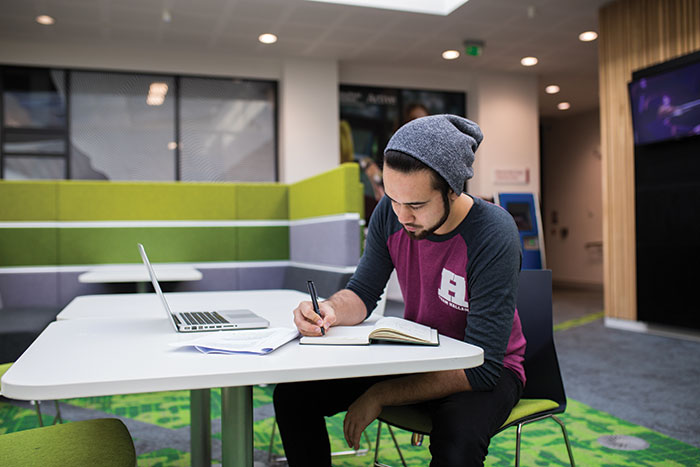 male student studying