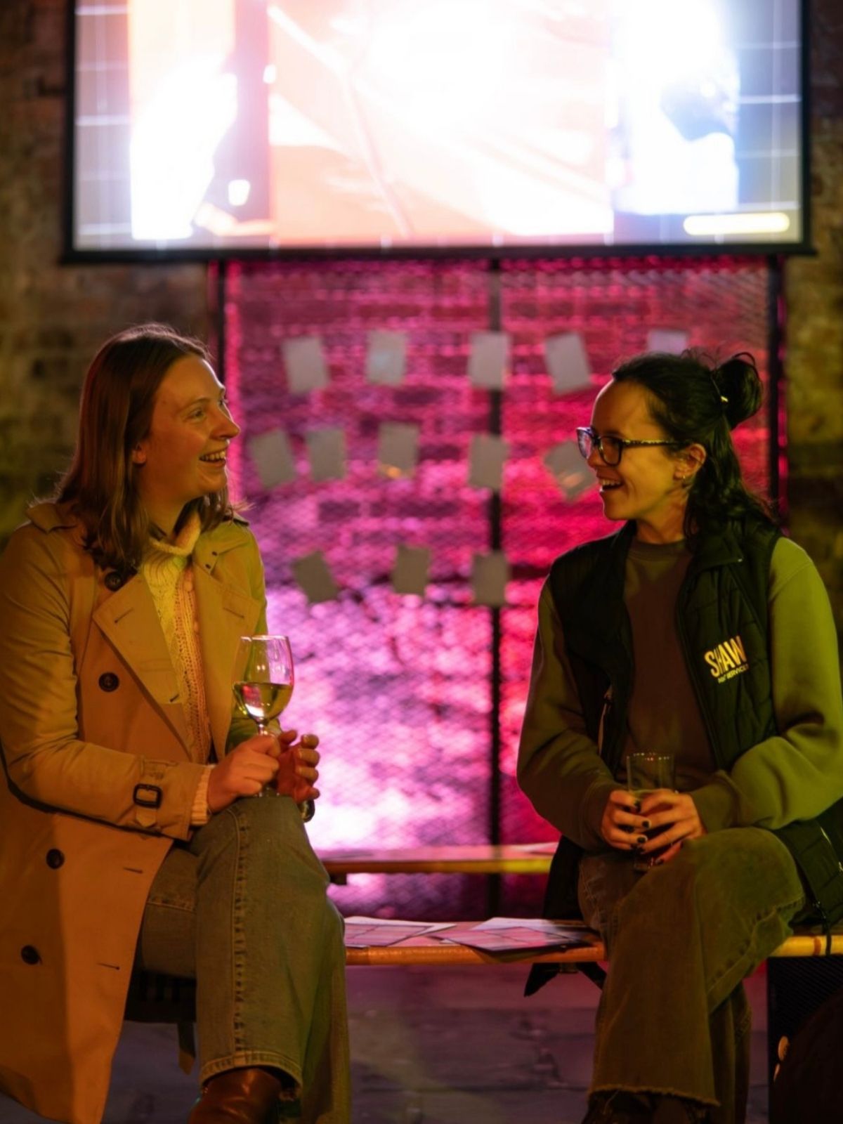 Two people sitting talking