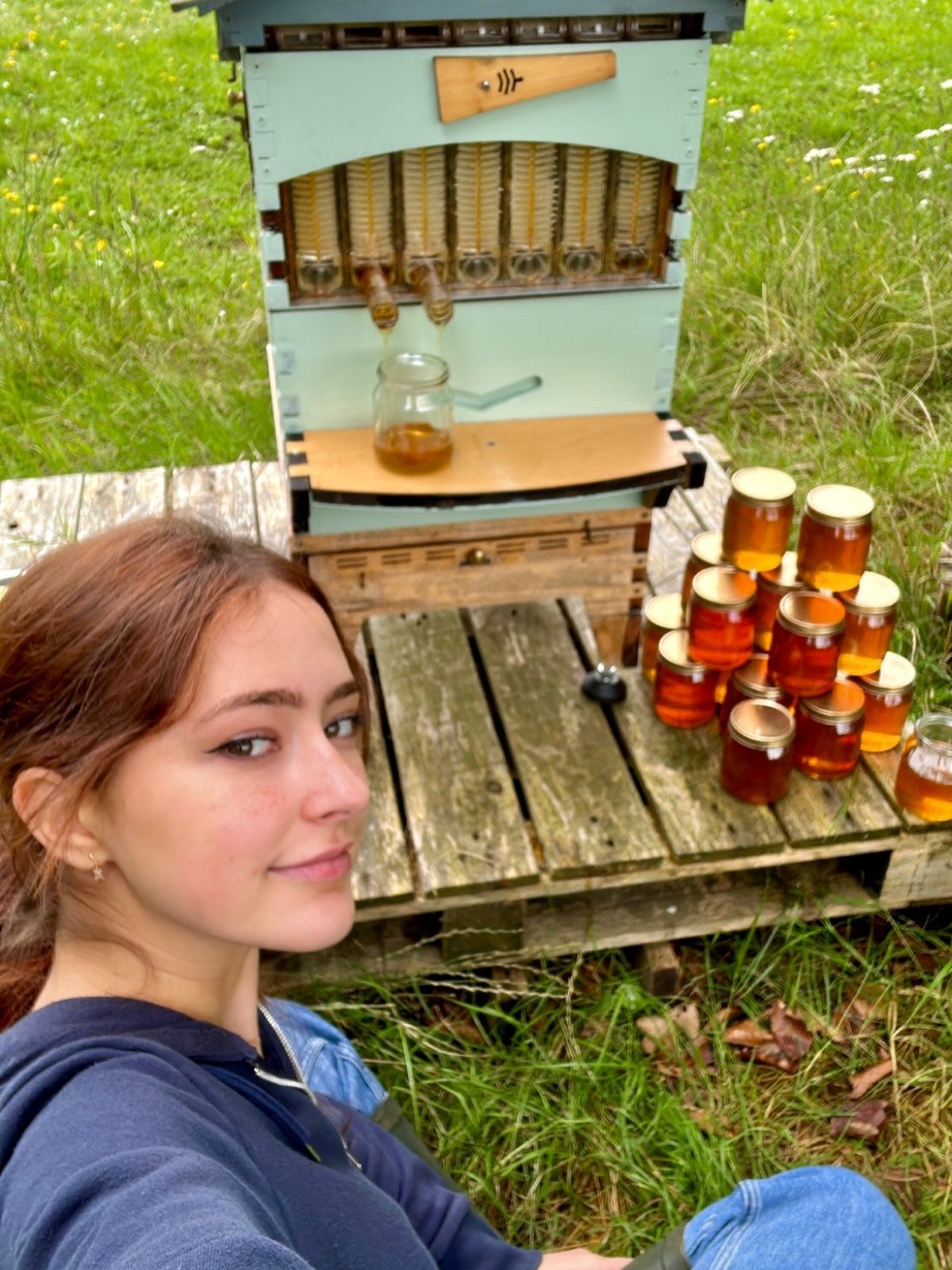 Person in front of hive