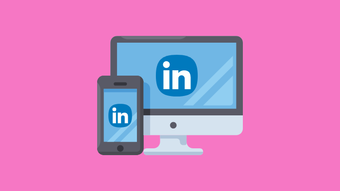 A computer and mobile phone with the LinkedIn logo on each device