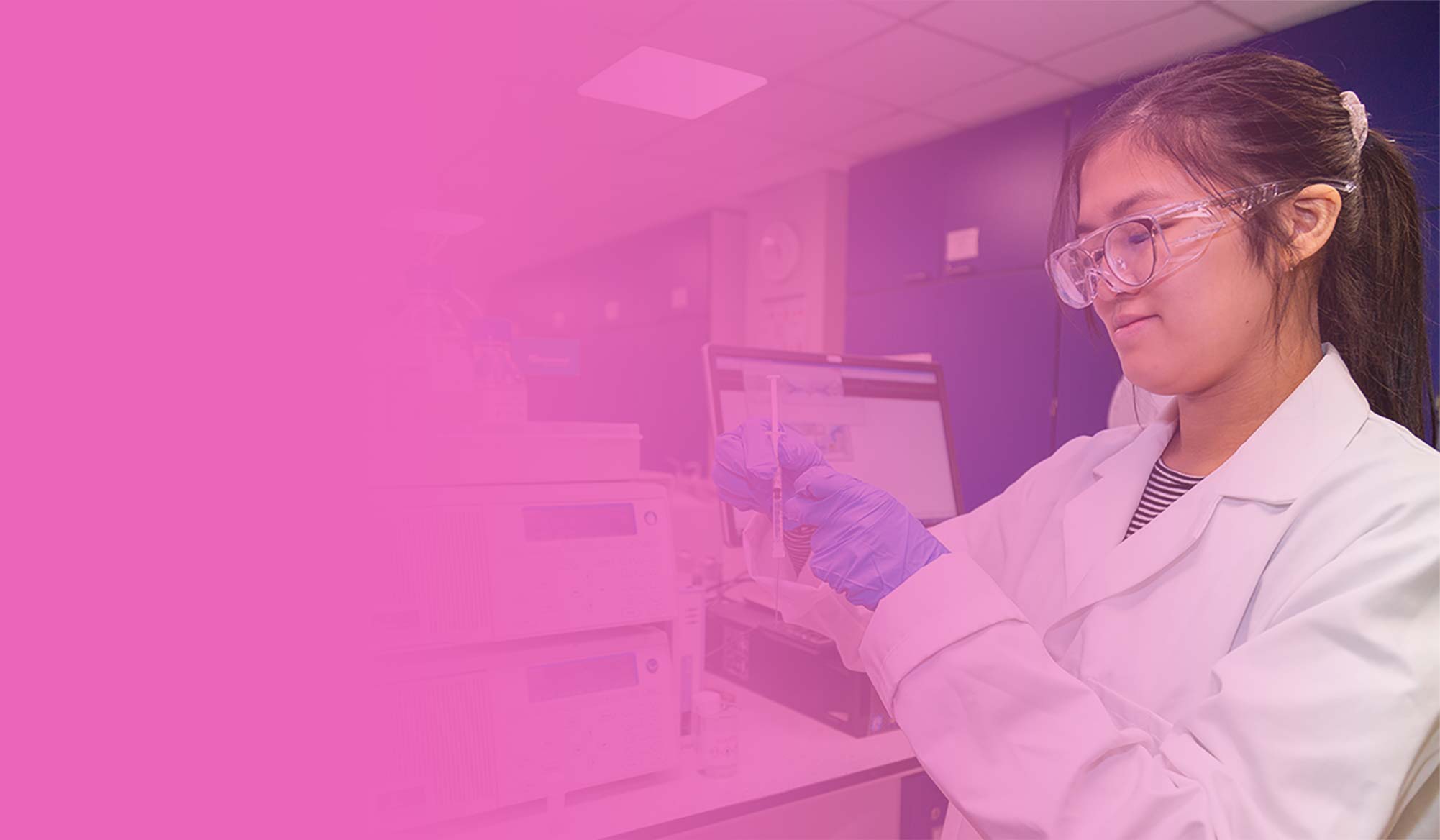 Chemistry student working in the laboratory, against a pink gradient background