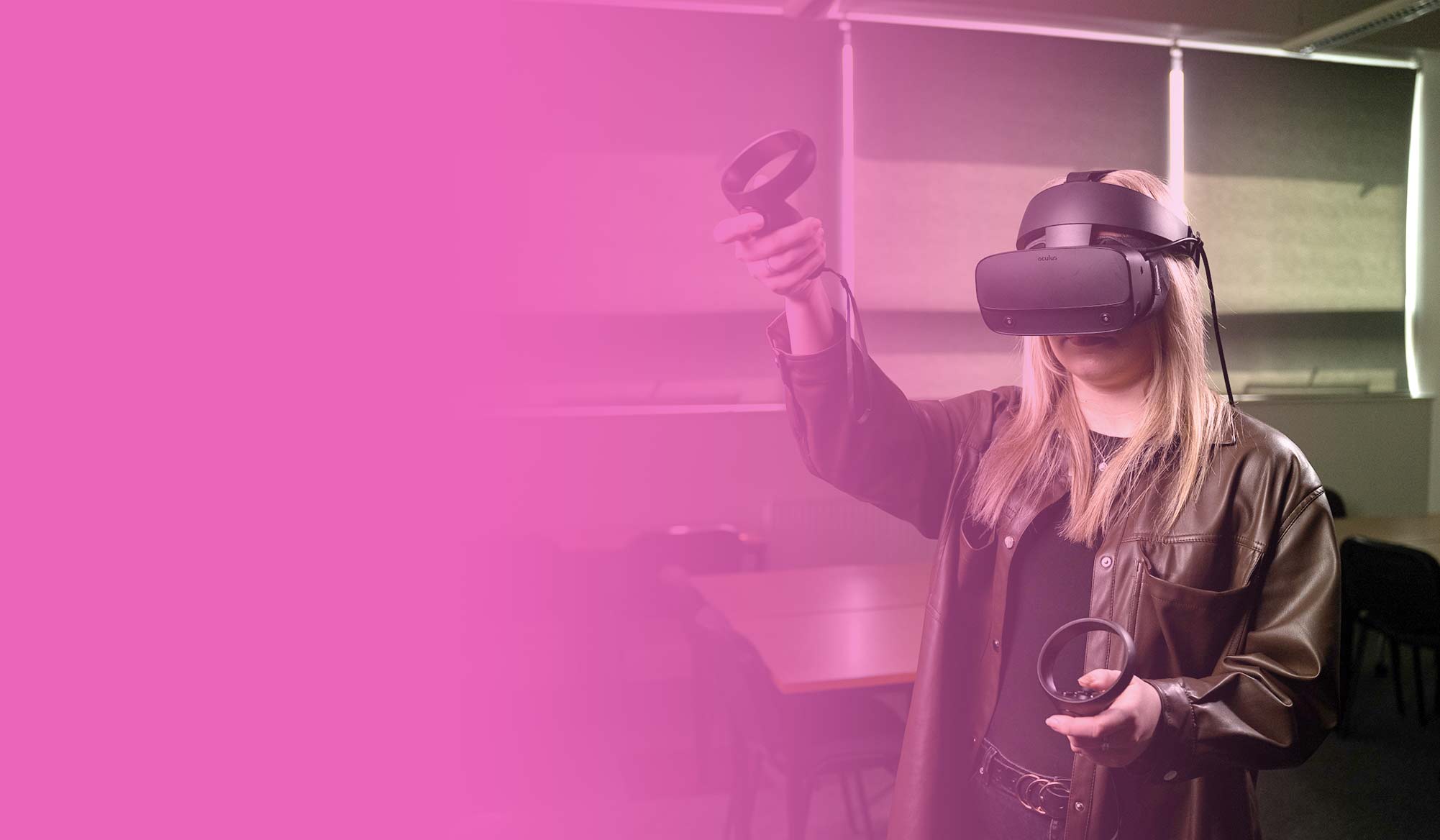 Students wearing VR headsets, against a pink gradient background