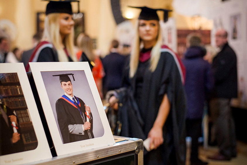 Example graduation photos on display