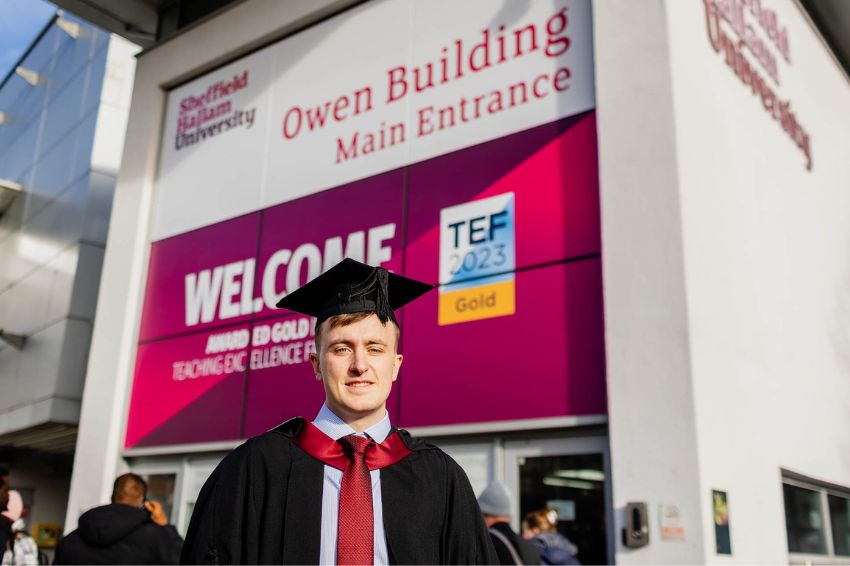A person in front of Owen Building during Sheffield Hallam graduation