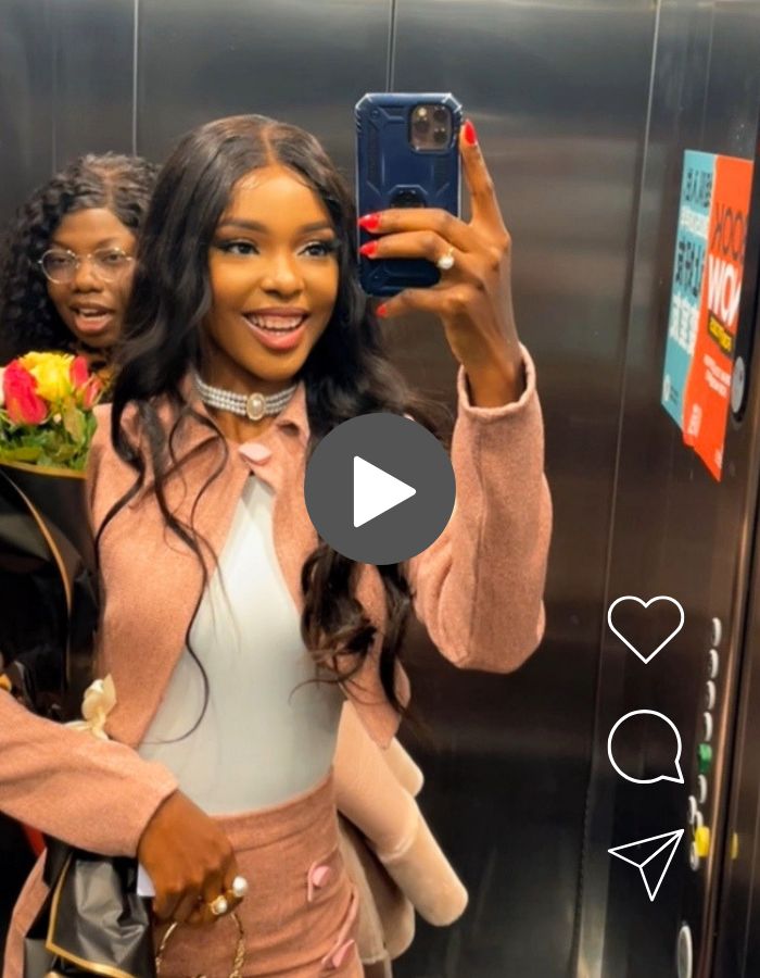 A person taking a selfie in a lift