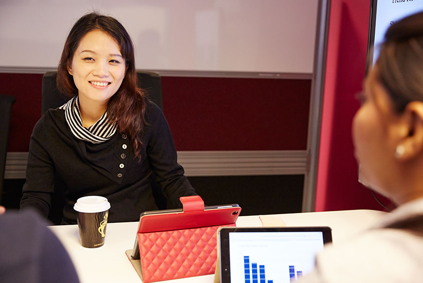 Students with table PCs talking