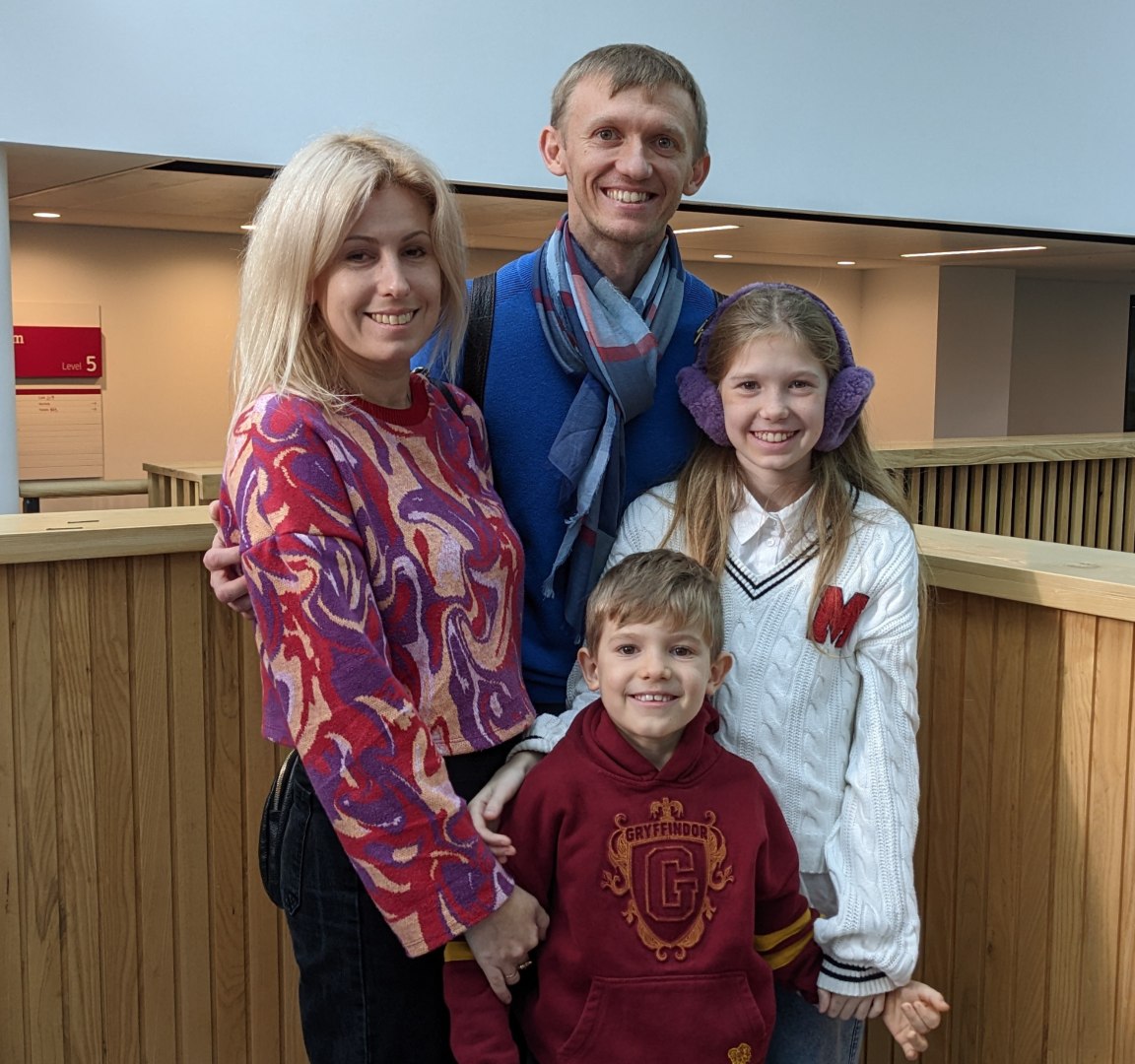 Smiling Ukrainian refugee family visiting Sheffield Hallam University Campus