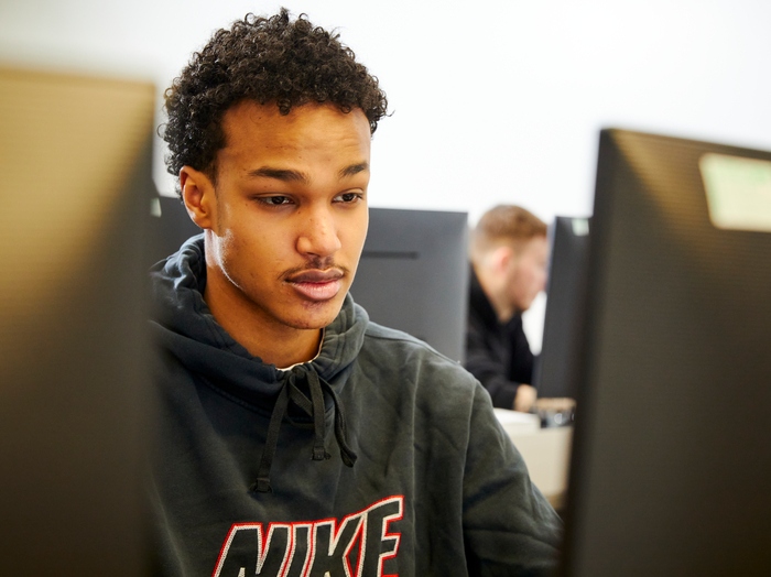 Student looking at a computer screen
