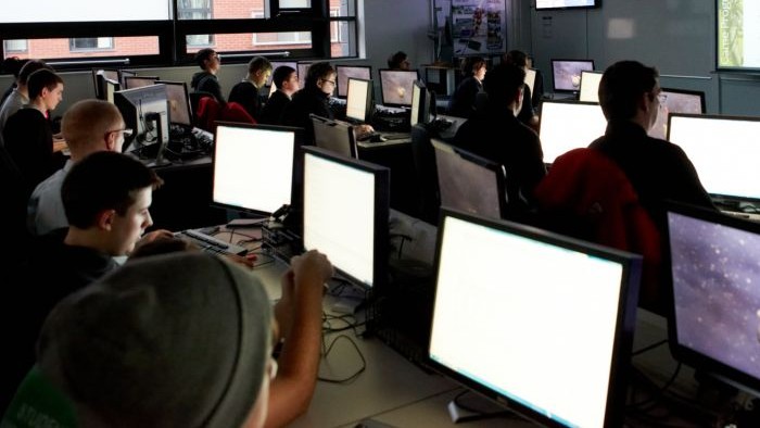 A computer room full of students