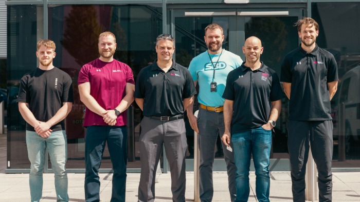 Members of the Sheffield Hallam Team (from l-r) Mathew Livingstone, Lee Bell, Tim Vernon, David Rogerson and Stephen Thompson with CEO and Founder of SBD Apparel Ltd, Benjamin Banks (blue shirt). 