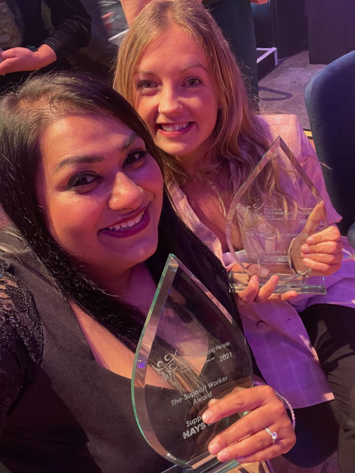 Nazma Liaqat (left) with her award