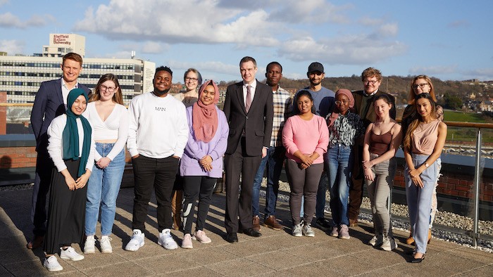  Far left: Mike Spooner, senior policy advisor at the OfS; centre: Lord Wharton; fourth from right: John Blake; with Sheffield Hallam students and Student Union officers