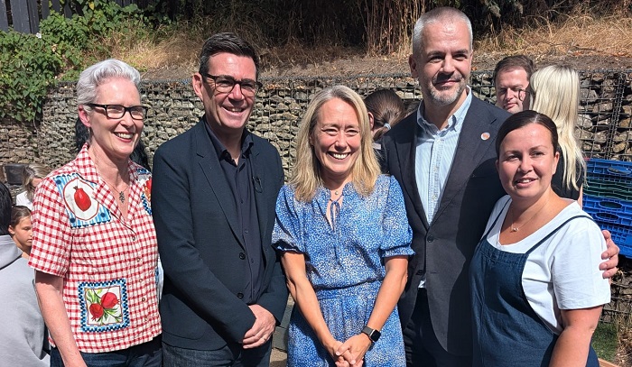 Prof Sally Pearse, PM Andy Burnham, Prof Liz Mossop, Oliver Coppard and Leanna Clark stood outside smiling at the camera
