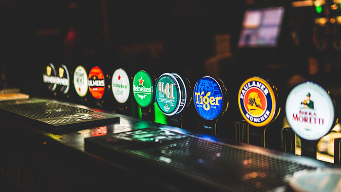 Beer taps across a bar
