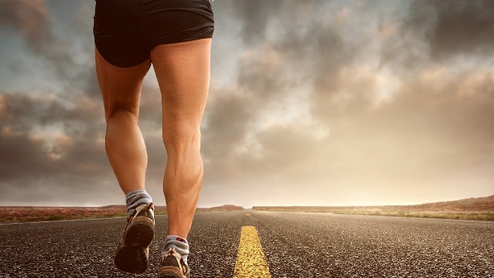 An stock image of someone running on a road