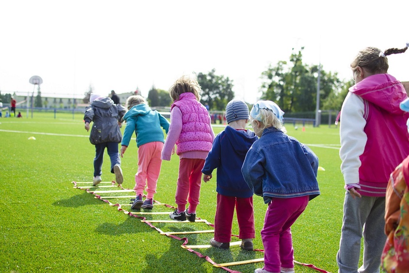 A group of children doing an outdoor activity