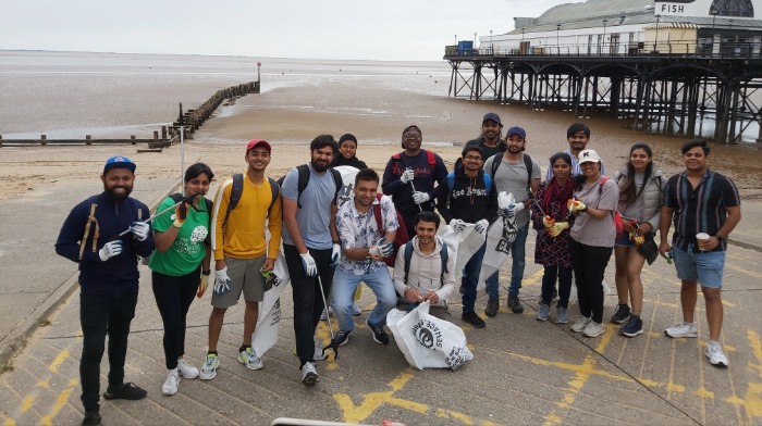Students at Cleethorpes beach for a beach clean session