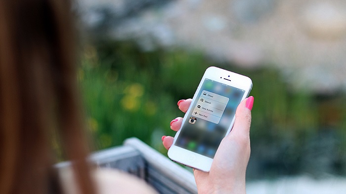 A person looking at a mobile phone