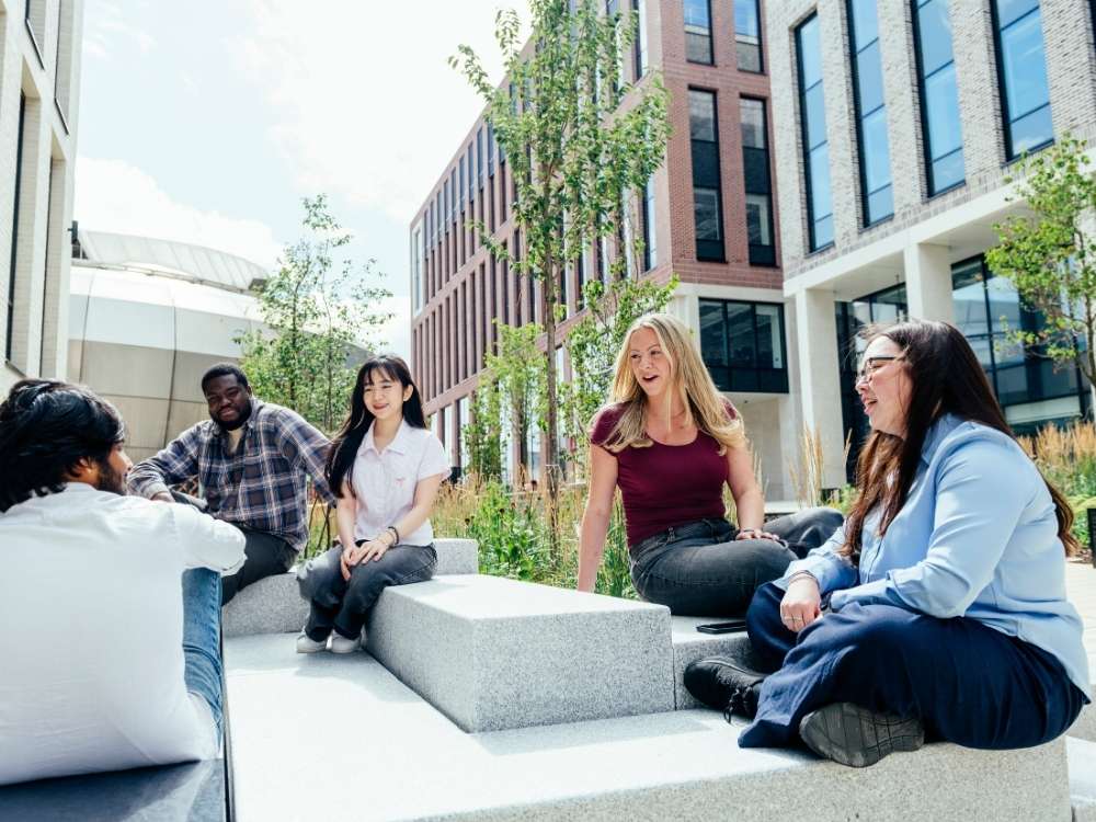Hallam students sat in Hallam Green