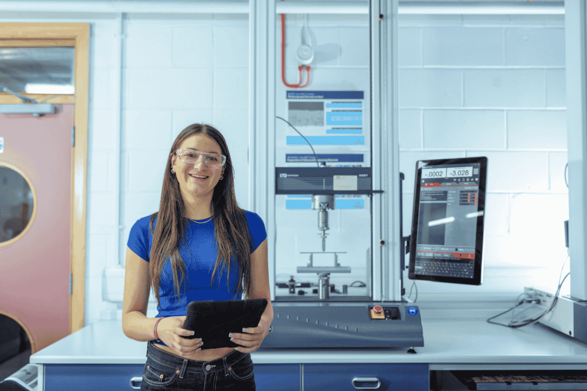 Engineering student on an ipad in a lab