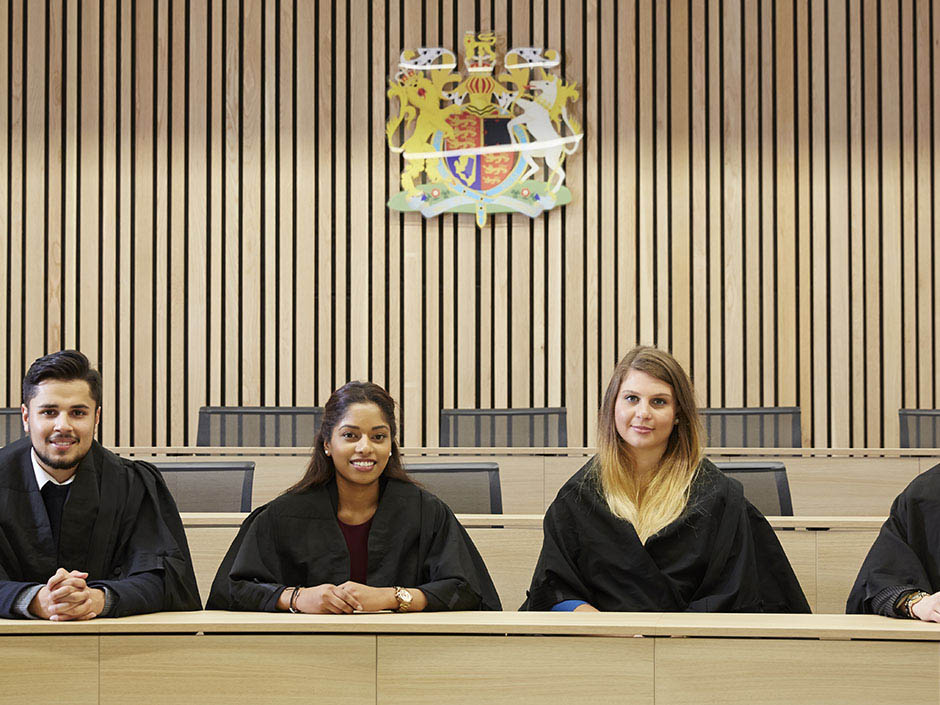 Several students in barristers' robes