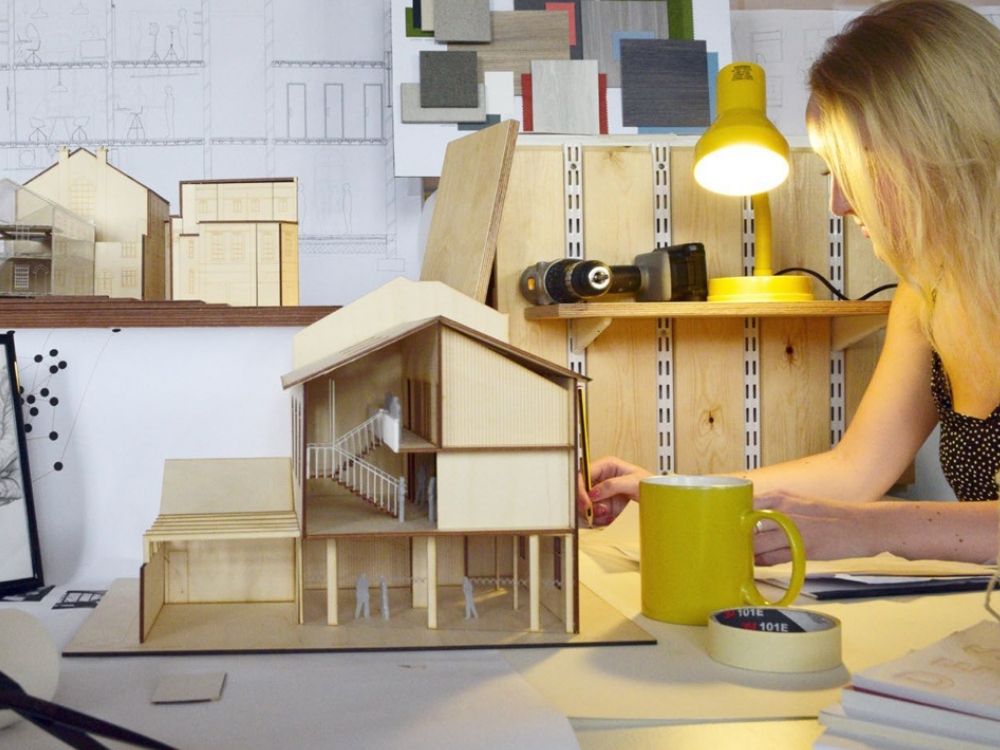 lady working on wood house