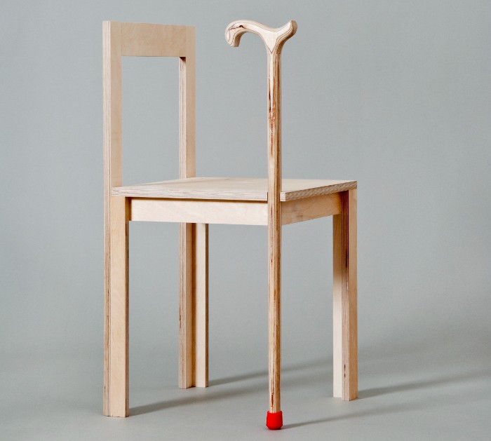 Wooden chair with walking stick