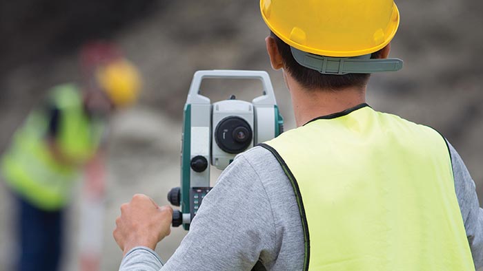 A student using a total station