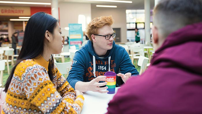 Students in discussion around a table