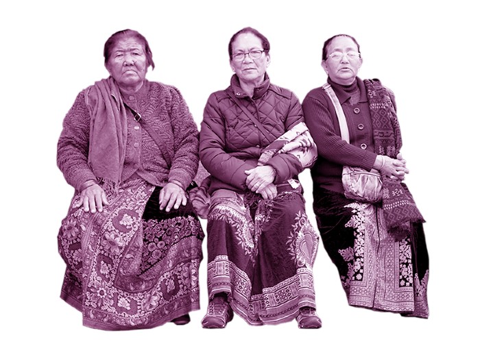 Image from the 'Alone Together' project. Three women sit together on a bench