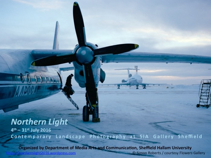 Promotional poster for Darcy White's Northern Light exhibition. Two propeller planes are parked on an icy runway