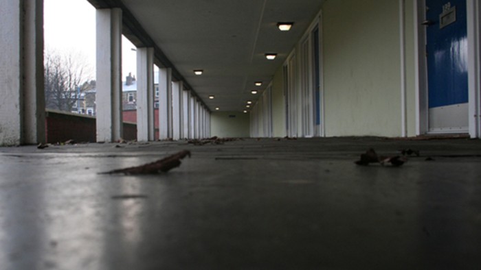 An image from the Elevation project. An outdoor corridor with pillars on the left  and doors on the right
