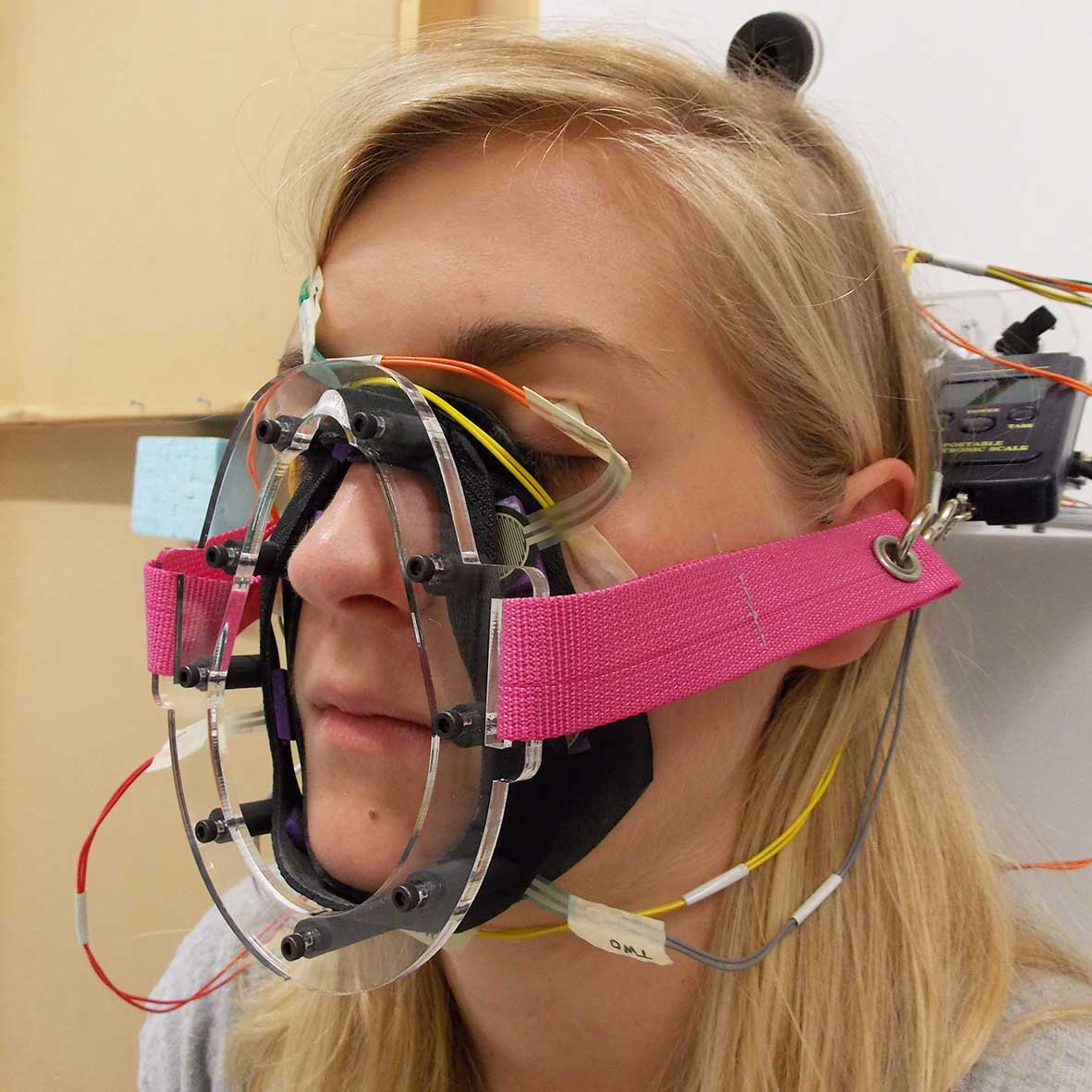 Researcher with NIV mask model