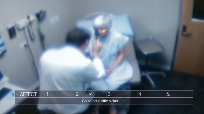 Film still of a doctor and a patient