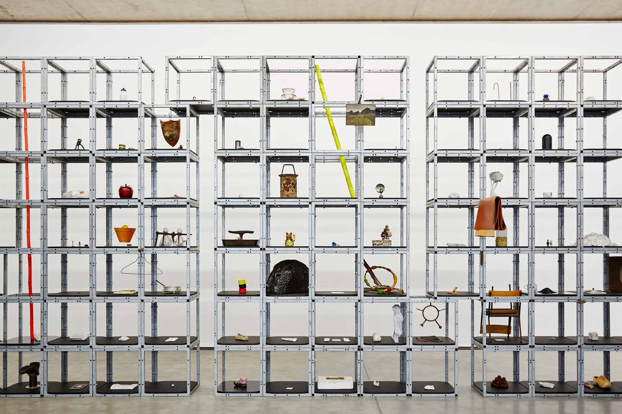 Keith Wilson's 'Calendar' exhibited at MAC - A metal structure of hollow cubes contains an assortment of items.