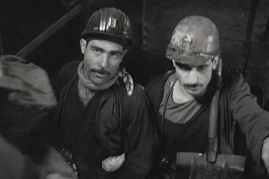 Still from Virginia Heath's 'We Are All Migrants' - migrant miners