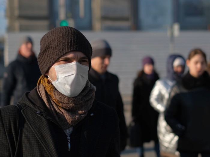 Man wearing mask in street