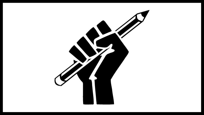 Black fist holding a pencil on a white background 