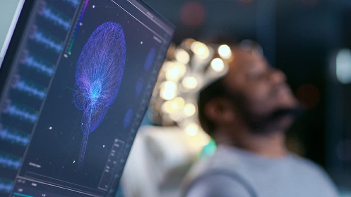 EEG Reading with man wearing brainwave scanning headset