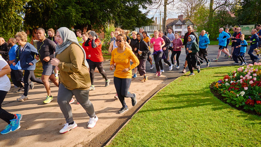 People running in a park